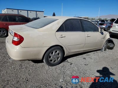Trzecie zdjęcie samochodu z tyłu: 2004 TOYOTA CAMRY LE VIN:4T1BE32K74U801383 - miniatura