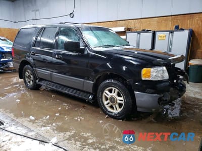 Czwarte zdjęcie samochodu z boku: 2003 FORD EXPEDITION XLT VIN:1FMPU16LX3LA61607 - miniatura