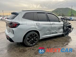 Trzecie zdjęcie samochodu z tyłu: 2022 BMW X3 SDRIVE30I VIN:5UX43DP04N9J26062 - miniatura