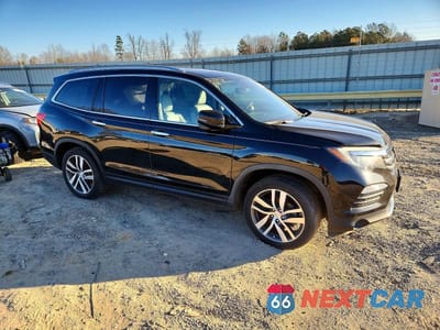 Czwarte zdjęcie samochodu z boku: 2017 HONDA PILOT TOURING VIN:5FNYF6H97HB075492 - miniatura
