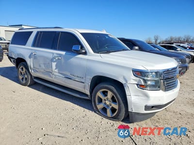 Czwarte zdjęcie samochodu z boku: 2018 CHEVROLET SUBURBAN C1500 PREMIER VIN:1GNSCJKC2JR201528 - miniatura