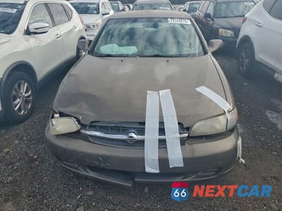Piąte zdjęcie samochodu w środku: 1999 NISSAN ALTIMA XE VIN:1N4DL01D0XC143734 - miniatura