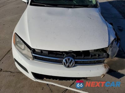 Zdjęcie 11 z 12 samochodu: 2014 VOLKSWAGEN TOUAREG V6 TDI VIN:WVGEP9BP8ED011467 - miniatura