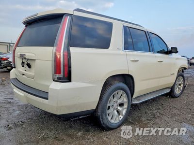 Trzecie zdjęcie samochodu z tyłu: 2015 GMC YUKON SLT VIN:1GKS2BKC1FR111851 - miniatura