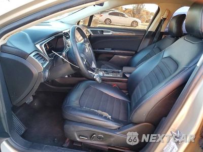 Zdjęcie 7 z 11 samochodu: 2017 FORD FUSION SE HYBRID VIN:3FA6P0LUXHR144709 - miniatura