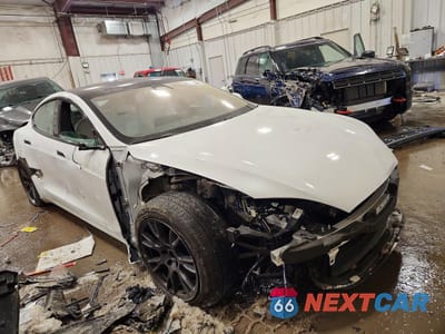 Czwarte zdjęcie samochodu z boku: 2023 TESLA MODEL S VIN:5YJSA1E5XPF502316 - miniatura