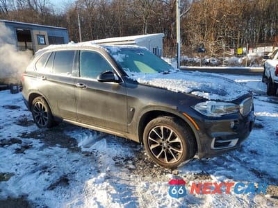 Czwarte zdjęcie samochodu z boku: 2018 BMW X5 XDR40E VIN:5UXKT0C59J0W00216 - miniatura