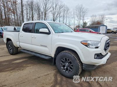 Czwarte zdjęcie samochodu z boku: 2022 TOYOTA TACOMA DOUBLE CAB VIN:3TMDZ5BN2NM126426 - miniatura