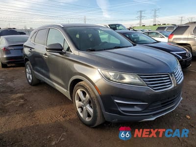 Czwarte zdjęcie samochodu z boku: 2017 LINCOLN MKC PREMIERE VIN:5LMCJ1C91HUL24064 - miniatura