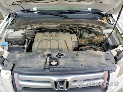 Zdjęcie 12 z 13 samochodu: 2007 HONDA PILOT EXL VIN:2HKYF18547H535191 - miniatura