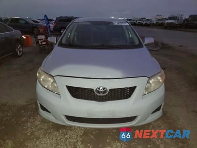 Piąte zdjęcie samochodu w środku: 2010 TOYOTA COROLLA BASE VIN:JTDBU4EE0A9114358 - miniatura