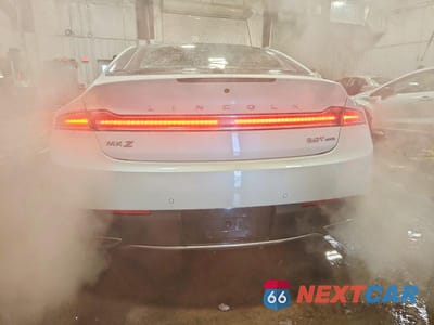 Zdjęcie 6 z 12 samochodu: 2017 LINCOLN MKZ RESERVE VIN:3LN6L5FC1HR628608 - miniatura