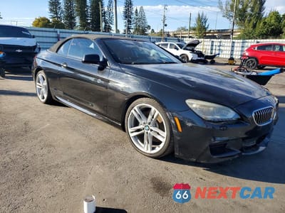 Czwarte zdjęcie samochodu z boku: 2014 BMW 640 I VIN:WBALW7C59EDX59092 - miniatura