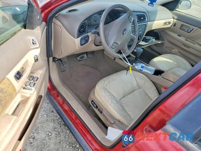 Zdjęcie 8 z 12 samochodu: 2000 FORD TAURUS SES VIN:1FAFP55S6YG290296 - miniatura