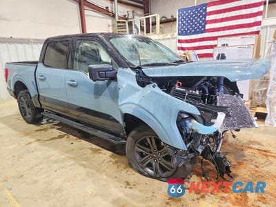 Czwarte zdjęcie samochodu z boku: 2023 FORD F150 SUPERCREW VIN:1FTFW1E86PKD82630 - miniatura