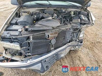 Zdjęcie 12 z 14 samochodu: 1999 CHEVROLET SUBURBAN C1500 VIN:3GNEC16R0XG196415 - miniatura