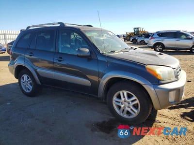 Czwarte zdjęcie samochodu z boku: 2003 TOYOTA RAV4 BASE VIN:JTEGH20V230093490 - miniatura