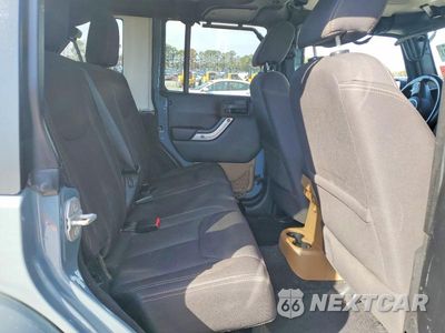 Zdjęcie 11 z 12 samochodu: 2015 JEEP WRANGLER UNLIMITED SAHARA VIN:1C4BJWEG6FL684400 - miniatura