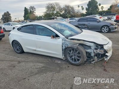 Czwarte zdjęcie samochodu z boku: 2020 TESLA MODEL 3 VIN:5YJ3E1EB1LF746512 - miniatura