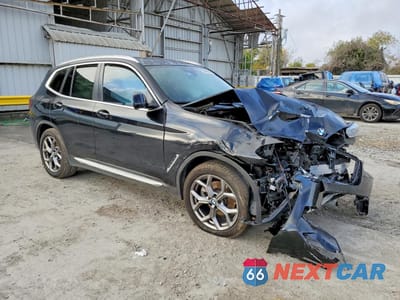Czwarte zdjęcie samochodu z boku: 2024 BMW X3 SDRIVE30I VIN:5UX43DP02R9U70009 - miniatura