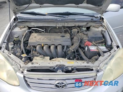 Zdjęcie 11 z 12 samochodu: 2003 TOYOTA COROLLA LE VIN:JTDBR32E030021668 - miniatura