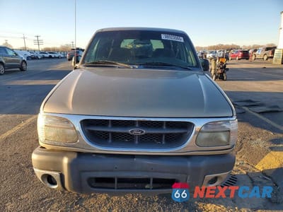Piąte zdjęcie samochodu w środku: 1999 FORD EXPLORER VIN:1FMZU34XXXZB03948 - miniatura