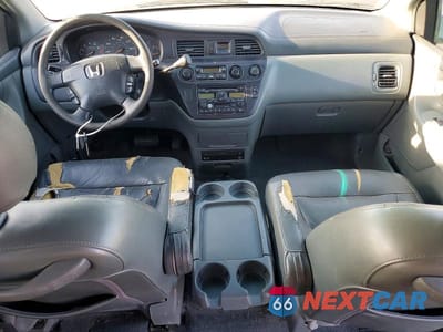 Zdjęcie 8 z 13 samochodu: 2002 HONDA ODYSSEY EXL VIN:2HKRL18042H584689 - miniatura