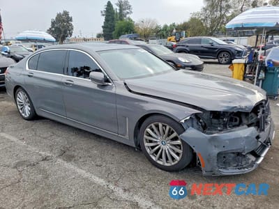 Czwarte zdjęcie samochodu z boku: 2021 BMW 740 I VIN:WBA7T2C03MCF81480 - miniatura