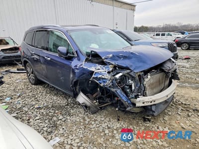 Czwarte zdjęcie samochodu z boku: 2017 HONDA PILOT TOURING VIN:5FNYF6H93HB100663 - miniatura