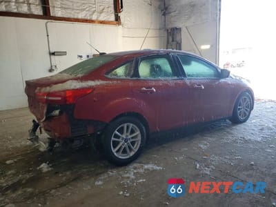 Trzecie zdjęcie samochodu z tyłu: 2018 FORD FOCUS SE VIN:1FADP3F25JL276879 - miniatura