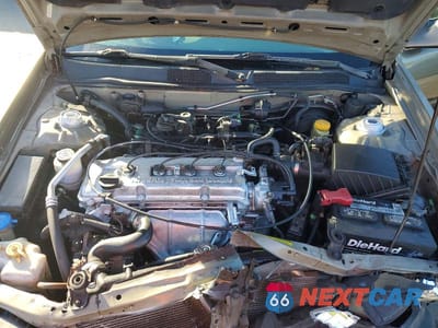 Zdjęcie 11 z 12 samochodu: 1999 NISSAN ALTIMA XE VIN:1N4DL01D9XC126561 - miniatura