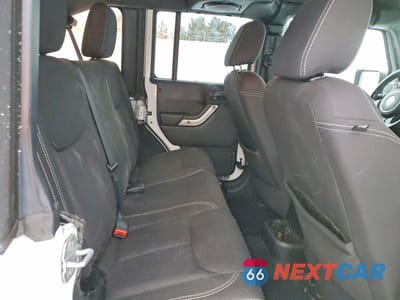 Zdjęcie 11 z 13 samochodu: 2014 JEEP WRANGLER UNLIMITED SAHARA VIN:1C4HJWEG5EL126269 - miniatura