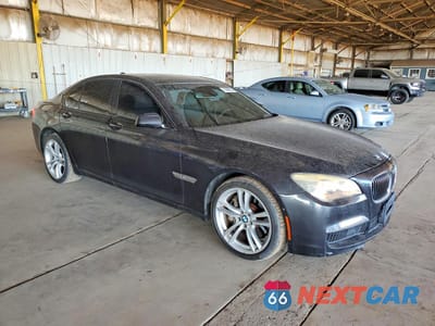 Czwarte zdjęcie samochodu z boku: 2010 BMW 750 I VIN:WBAKA8C54ACY36077 - miniatura