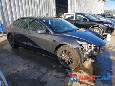 Czwarte zdjęcie samochodu z boku: 2023 TESLA MODEL 3 VIN:5YJ3E1EA3PF699223 - miniatura