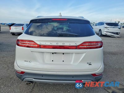Zdjęcie 6 z 12 samochodu: 2015 LINCOLN MKC VIN:5LMCJ1A94FUJ19967 - miniatura