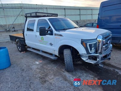 Czwarte zdjęcie samochodu z boku: 2011 FORD F350 SUPER DUTY FLATBED TRUCK VIN:1FT8W3BT7BEB14187 - miniatura