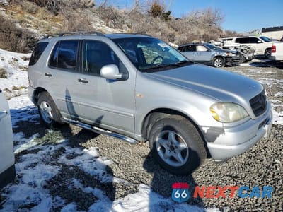 Czwarte zdjęcie samochodu z boku: 2000 MERCEDES-BENZ ML 320 VIN:4JGAB54E6YA210542 - miniatura