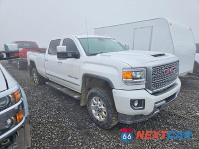 Czwarte zdjęcie samochodu z boku: 2019 GMC SIERRA K3500 DENALI VIN:1GT42WEY8KF205417 - miniatura