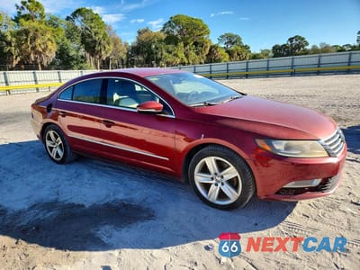 Czwarte zdjęcie samochodu z boku: 2014 VOLKSWAGEN CC SPORT VIN:WVWBP7AN2EE523361 - miniatura