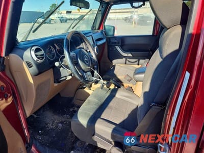 Zdjęcie 7 z 12 samochodu: 2012 JEEP WRANGLER UNLIMITED SAHARA VIN:1C4BJWEGXCL173008 - miniatura