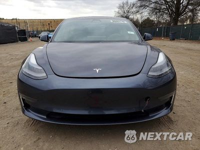 Piąte zdjęcie samochodu w środku: 2021 TESLA MODEL 3 VIN:5YJ3E1EB1MF979257 - miniatura