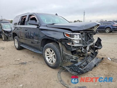 Czwarte zdjęcie samochodu z boku: 2019 CHEVROLET TAHOE K1500 LT VIN:1GNSKBKC2KR363928 - miniatura