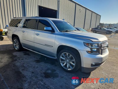Czwarte zdjęcie samochodu z boku: 2015 CHEVROLET SUBURBAN C1500 LTZ VIN:1GNSCKKC0FR550698 - miniatura