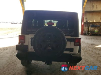 Zdjęcie 6 z 11 samochodu: 2013 JEEP WRANGLER UNLIMITED SAHARA VIN:1C4BJWEG5DL613413 - miniatura