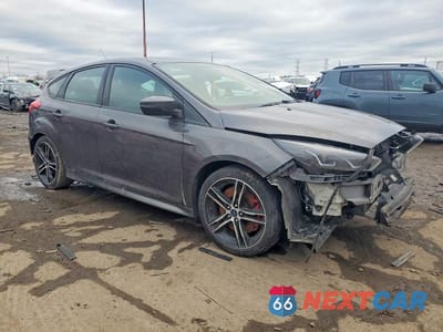 Czwarte zdjęcie samochodu z boku: 2016 FORD FOCUS ST VIN:1FADP3L91GL202613 - miniatura