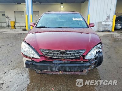 Piąte zdjęcie samochodu w środku: 2004 TOYOTA CAMRY LE VIN:4T1BF30K04U077830 - miniatura