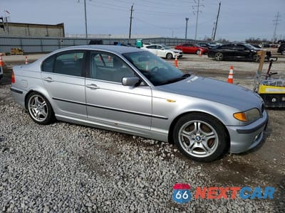 Czwarte zdjęcie samochodu z boku: 2002 BMW 330 I VIN:WBAEV53492KM02168 - miniatura