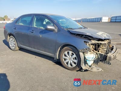 Czwarte zdjęcie samochodu z boku: 2010 TOYOTA COROLLA BASE VIN:2T1BU4EE2AC398585 - miniatura