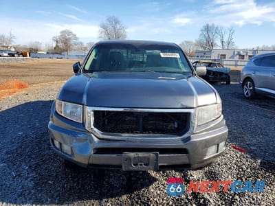 Piąte zdjęcie samochodu w środku: 2011 HONDA RIDGELINE RTL VIN:5FPYK1F58BB001706 - miniatura