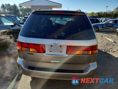 Zdjęcie 6 z 13 samochodu: 2004 HONDA ODYSSEY EX VIN:5FNRL18644B024788 - miniatura